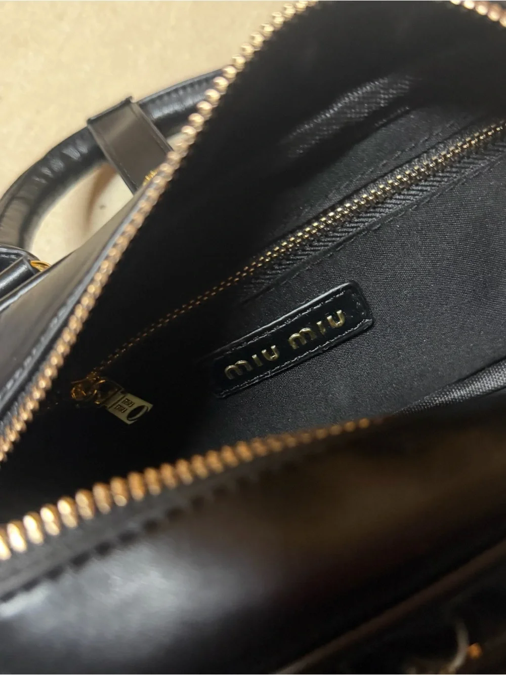 Miu Miu Black Quilted Leather Satchel with Gold Hardware